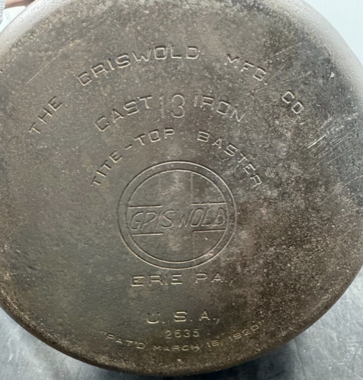 Antique Griswold number 13 cast iron Tite-Top Baster bottom with slant logo EPU, pattern number 2635. Sold for $2,500. 